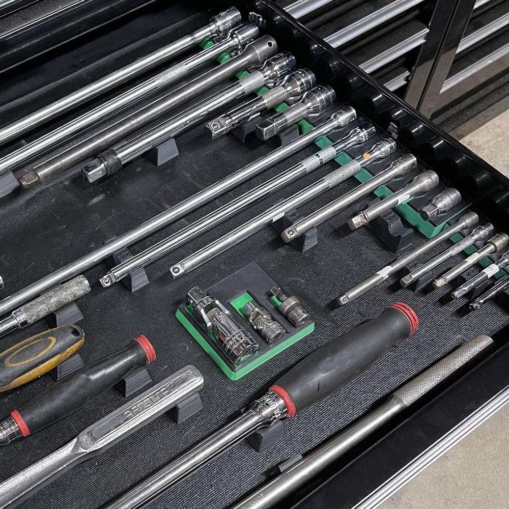 MagAttach extension and ratchet holders organizing a toolbox drawer